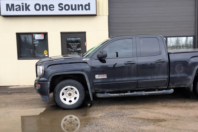 GMC 2017 Sierra with professional window tint in North Bay
